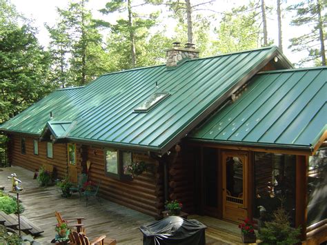 log house with green metal roof|green roof stucco house.